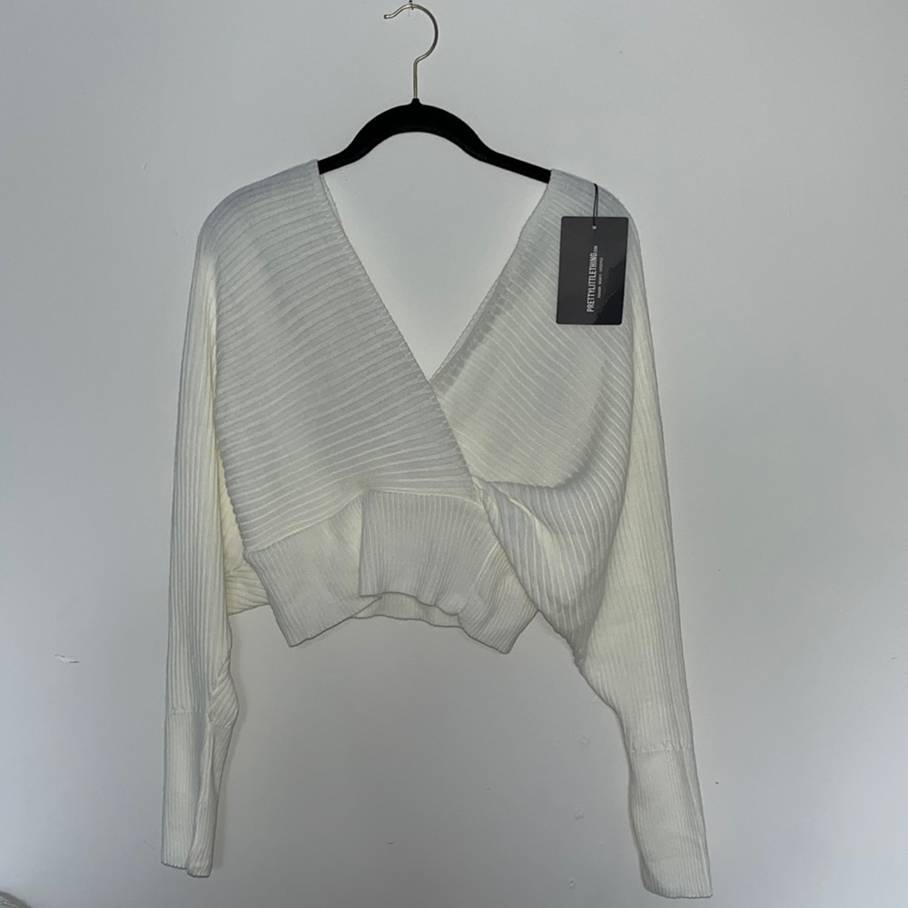 Ivory wrap off the shoulder jumper